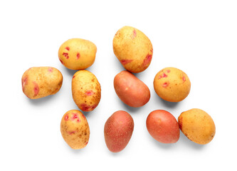 Many fresh raw potatoes on white background