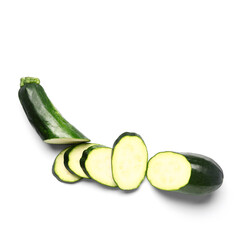 Fresh green zucchini with slices on white background