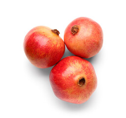 Fresh pomegranates on white background