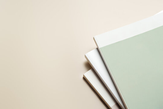 Stack of blank paper on beige background