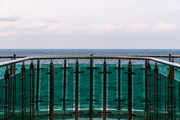 green observatory against the cloudy sea