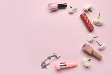 Composition with makeup products and beautiful chrysanthemum flowers on pink background