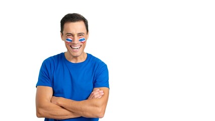 Man standing with thai flag painted on face smiling