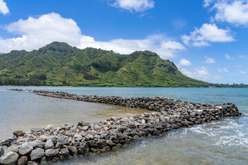 Huilua Fishpond, in Ahupuaʻa O Kahana State Park on windward Oʻahu, is one of the few surviving ancient Hawaiian fishponds that were still operational well into the 20th century. Honolulu, Oahu, Hawai