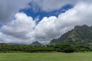 Kualoa Regional Park, Oahu, Hawaii.  Koʻolau Range is a name given to the dormant fragmented remnant of the eastern or windward shield volcano of the Hawaiian island of Oʻahu. 