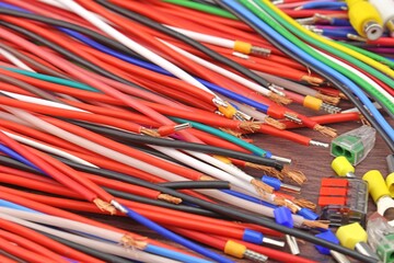 Copper stranded mounting electrical wires in colored insulation for electrical equipment. Close-up. Soft focus.