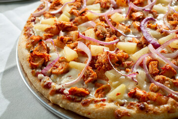 A view of a BBQ chicken pizza.