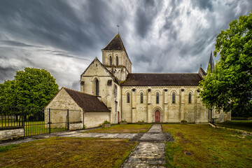 Église Notre-Dame de Lencloître  Under Cloudy Skies