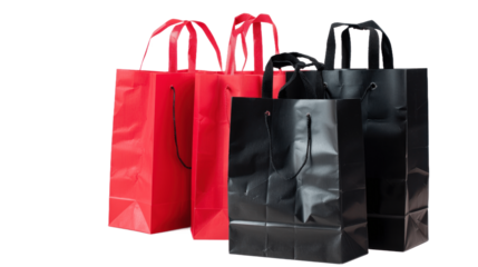 Black and red paper shopping bags isolated on transparent background PNG Gifts and shopping concept