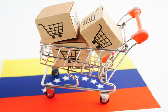 Online shopping, Shopping cart box on Colombia flag, import export, finance commerce. - Powered by Adobe