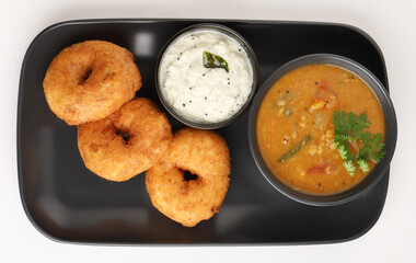 Vada or Medu vadai with sambar and chutney - Popular South Indian snack or breakfast
