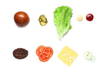 Top view of ingredients for tasty burger isolated on white background