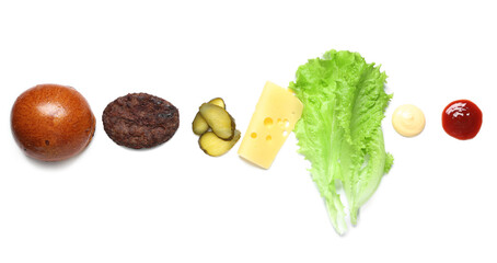 Top view of ingredients for tasty burger isolated on white background