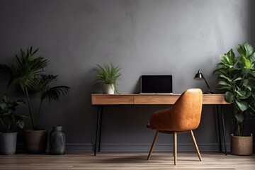 Chair at wooden table with computer monitor and plants in grey spacious home office interior