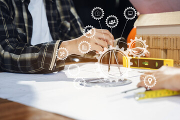 Engineer Teamwork Meeting, Drawing working on blueprint meeting for project working with partner on model building at company office.