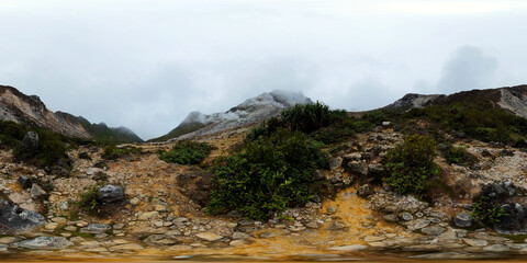 Crater of an active volcano with vegetation and slopes with fumaroles. Sumatra, Indonesia. 360 panorama.