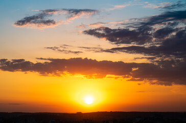 Dramatic orange sunset sky. Natural background