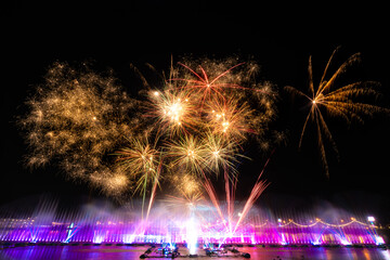 Fire work with water fountain laser show.