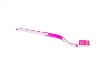 Closeup of toothbrush isolated on white background.