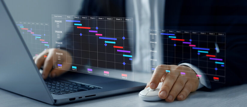Project manager updating tasks and milestones progress planning with Gantt chart scheduling interface for company.Business Project Management System.