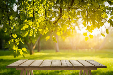Naklejka premium Spring summer beautiful natural background with green foliage in sunlight and empty wooden table outdoors. Abstract backgrounds wallpaper. Ai generative