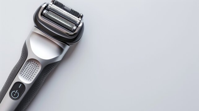 Electric shaver on white background with copy space