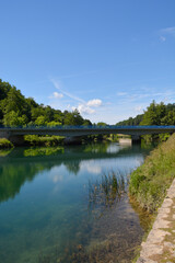 Fototapeta premium Bridge over the Dobra River at Jarce Polje in Croatia