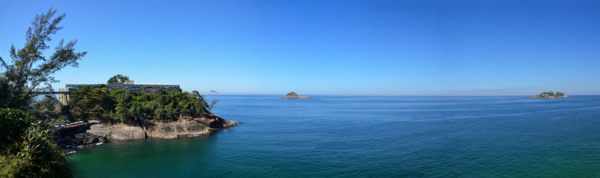 Panoramic view of the sea from the Joatinga beach viewpoint, Rio de Janeiro, Brazil. Day with blue sky.