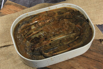 Fried whole lampreys on a plate, Fish delicacies, Latvian cuisine