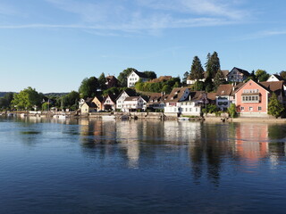 Fototapeta premium Lakeside view to Rhine River in European STEIN AM RHEIN town in SWITZERLAND