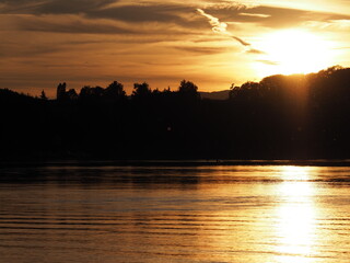 Fototapeta premium Landscape of sun set on Rhine River near Stein am Rhein town in Switzerland