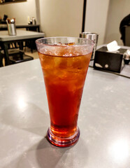 Glass of Sweet Iced Tea with Ice Cubes