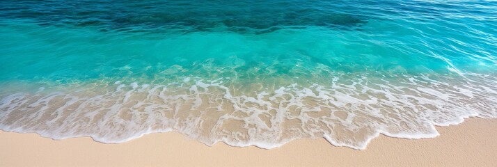 ultra wide top down view of sandy beach and turquoise blue water splashing on the coast, image is ready to place text or other content