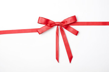 Red Satin Bow on White Background