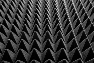 Black acoustic foam as an abstract background.