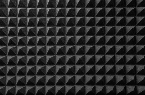 Black acoustic foam as an abstract background.
