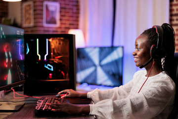 Happy gamer playing intense classic arcade spaceship racing videogame, doing flying maneuvres...