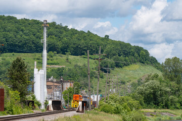 Fuel refinery train tracks industrial background copy space image, natural resources, power energy,...