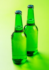 Beer bottles on green