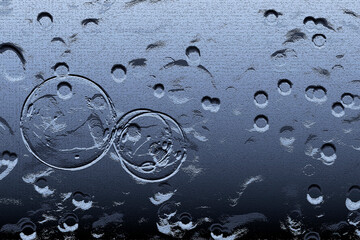 Craters and circles on the metallic gradient blue surface  for background and the purpose of web and design use