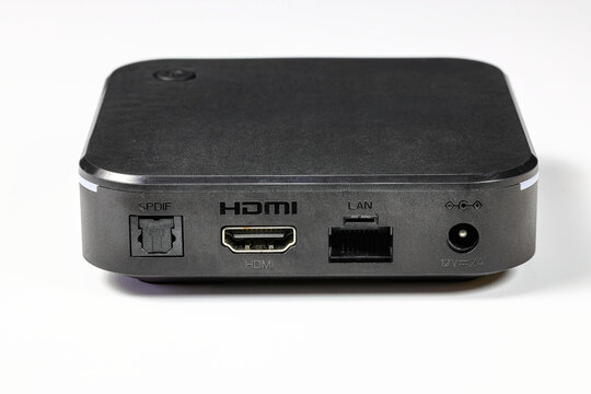 multiple ports or connectors LAN, HDMI, SPDIF of tiny computer or multimedia box or android box isolate on white background.