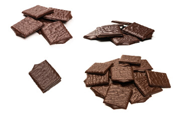 Dark chocolate candies isolated on white background.