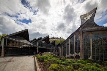 Exterior of the Saint Joan of Arc Church in Rouen, France, during a cloudy day