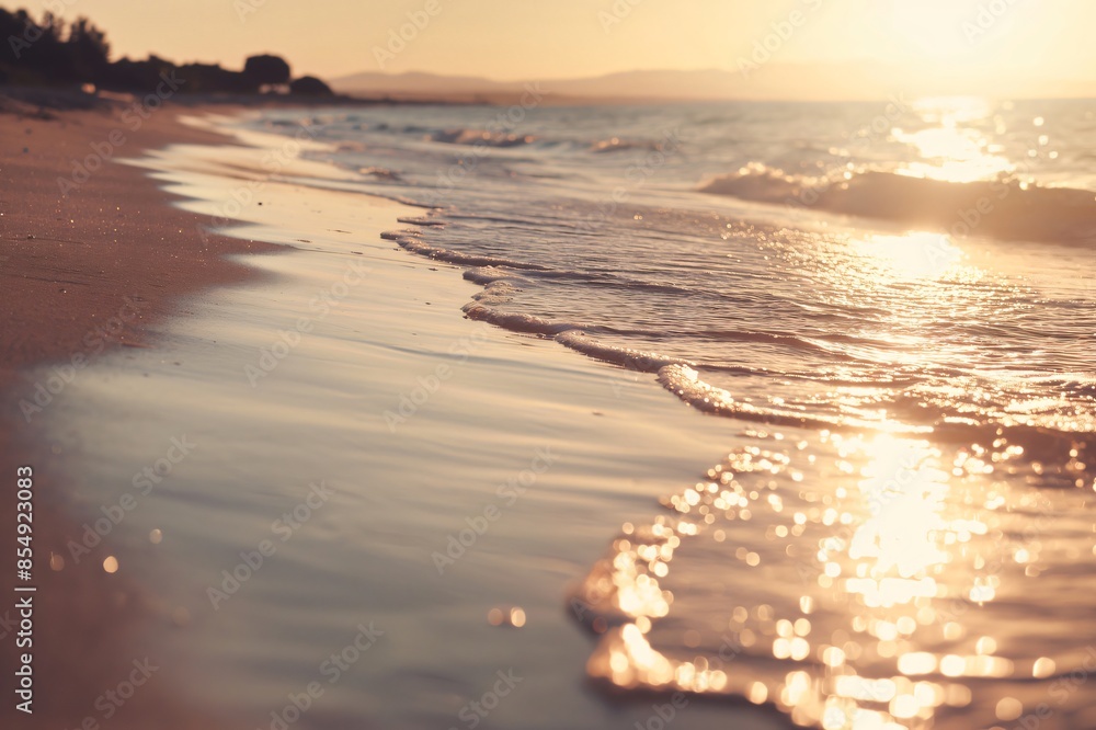 Poster tranquil beach setting captured during the golden hour with warm tones highlighting the gentle waves