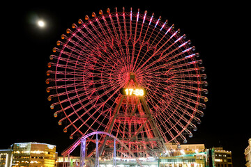 ferris wheel at cosmo world fun park at minato mirai , Yokohama is the third biggest city in Japan.