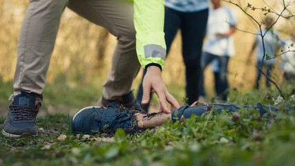 Rescuers group finding murdered barefoot victim in the forest, scared people calling the police....