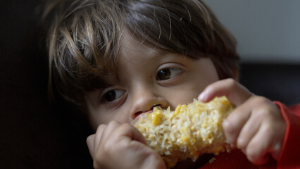 Close-Up of Young Boy Enjoying Corn on the Cob - Healthy Child Eating