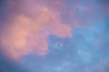 Obraz premium Beautiful clouds in the sky at sunset, pink and blue, natural background, romance, magic