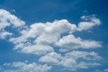 bright blue sky and scattered white clouds