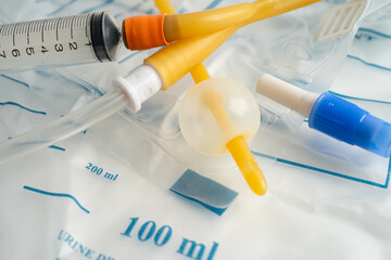 Foley urinary catheter with urine bag for disability or patient in hospital.